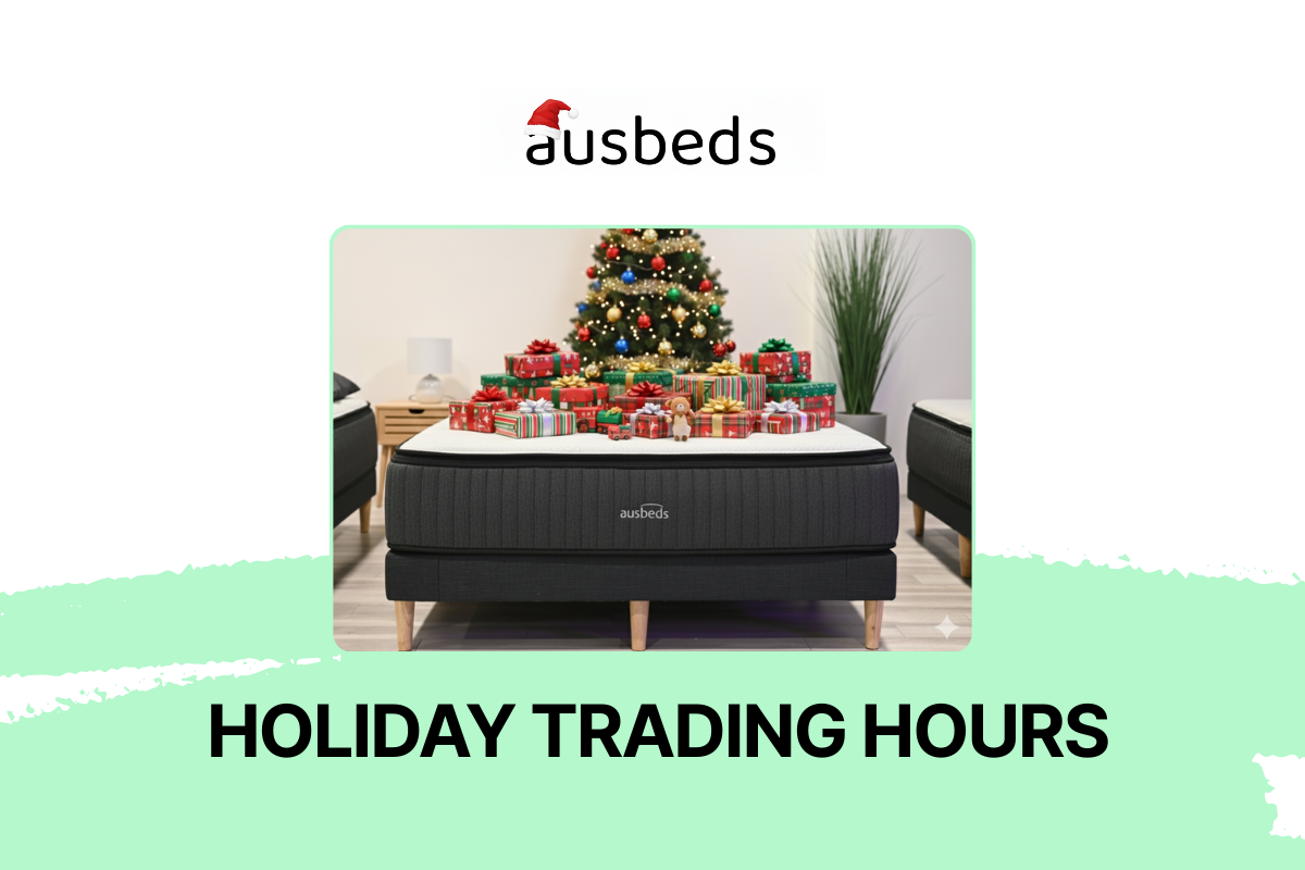 An image of an Ausbeds mattress with Christmas presents and a Christmas tree at the back.
The text says, "Ausbeds Holiday Trading Hours."