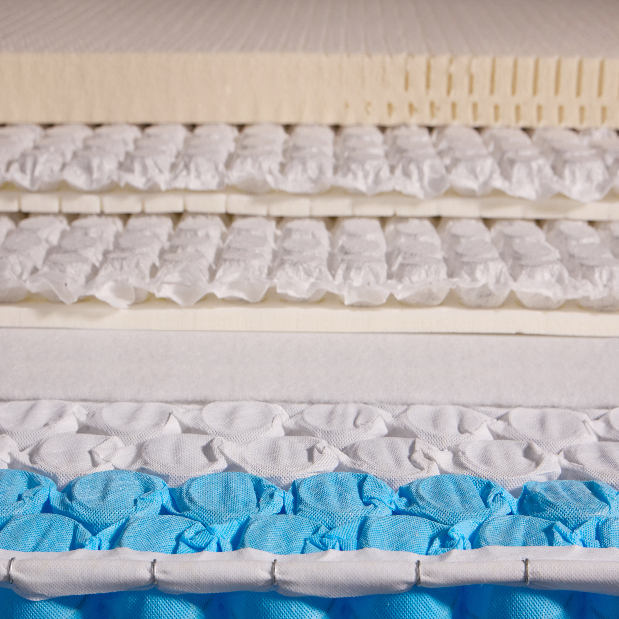 Cross section shot, all layers of Cloud shown- latex, 2 microsprings and honeycomb pocketsprings
